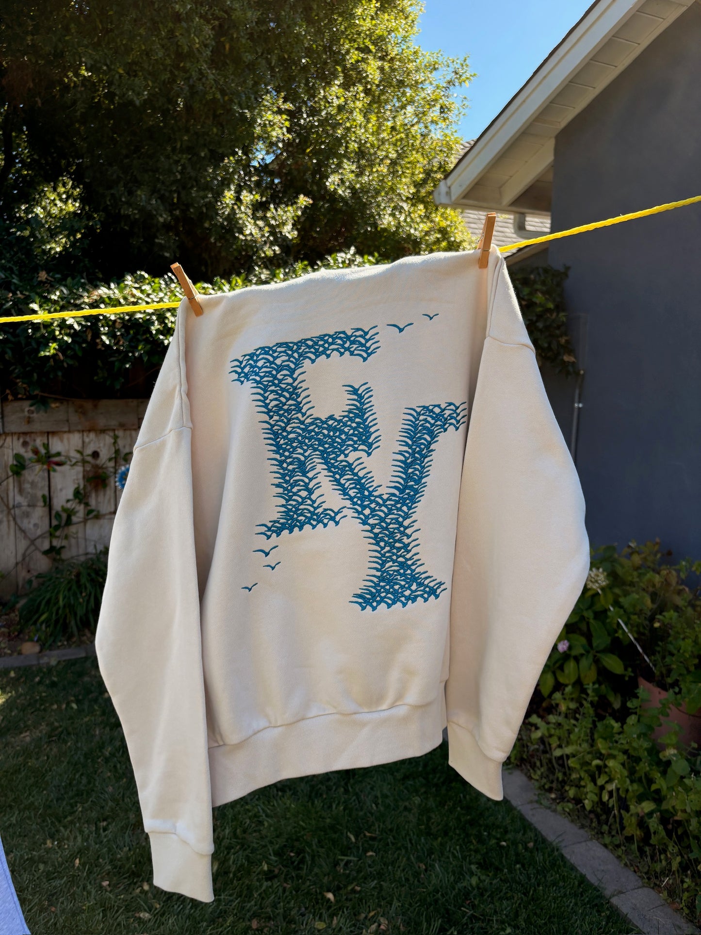 FY BIRD HOODIE CREAM BLUE